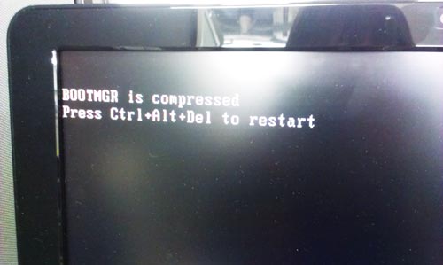 BOOTMGR is compressedと表示され、Windows XPが起動できない。